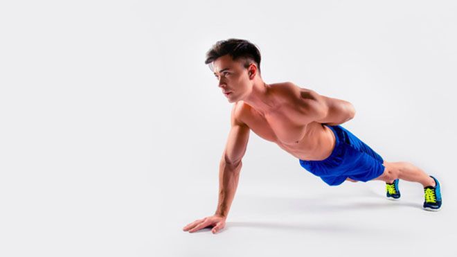 HOW TO DO A ONE ARM PUSHUP – AND BUILD A BIGGER CHEST IN THE PROCESS