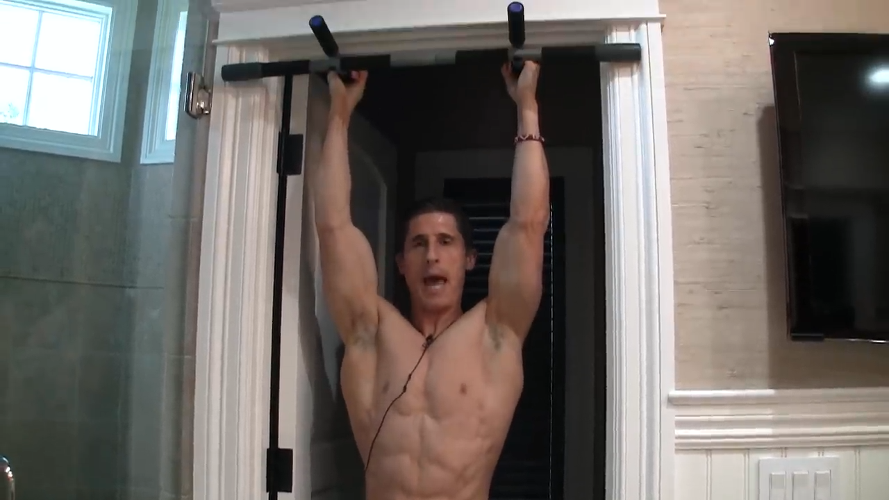 pull down the shoulder blades in the hanging abs exercise to reinforce scapular stability