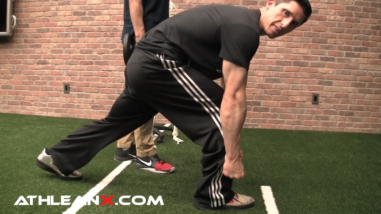 stepping forward in sprinter lunge to load the glutes