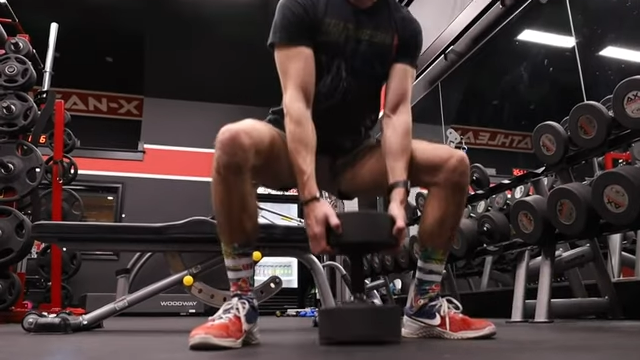 dumbbell drop squat